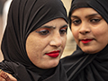 Two Women Visiting a Delhi Hindu Mosque