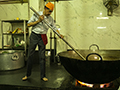 Volunteer Helping Prepare Meal in Sikh Community Kitchen