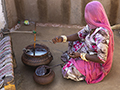 Woman Making Buttermilk and Ghee