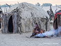 Himba Woman with Morning Fire