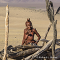 Himba Woman at Compound Fence