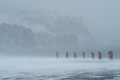 Explorers Hiking in a Blizzard